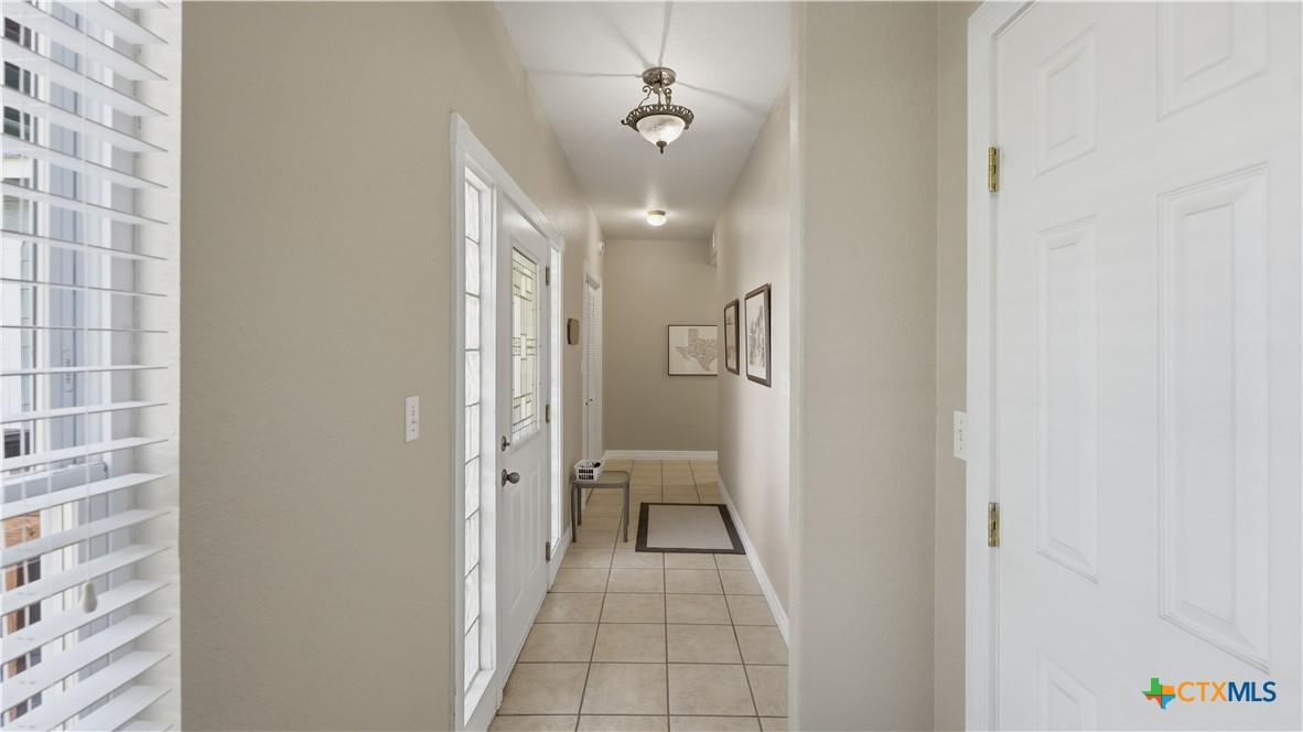 Image 2: Entry toward bedrooms