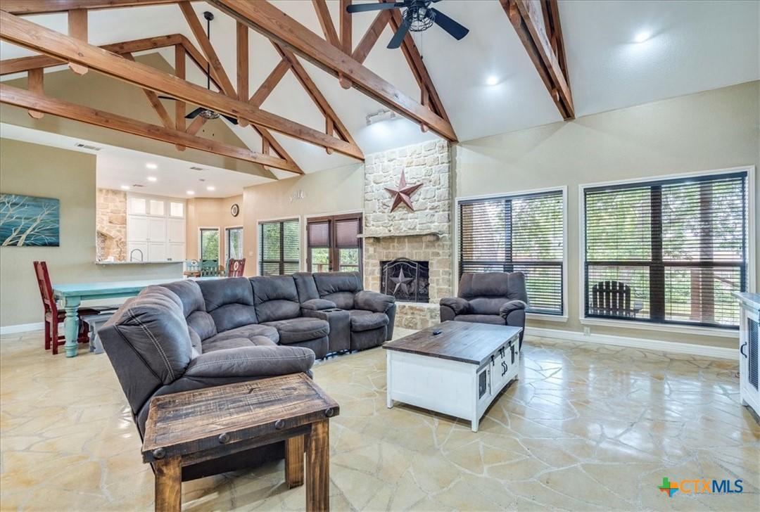 Image 3: This Custom home features vaulted ceilings with ex