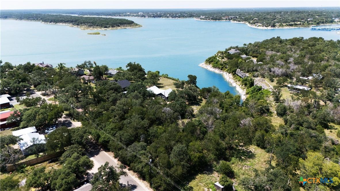 Image 2: Enjoy views of the lake one side and woods on the