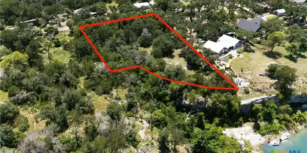 Image 3: Over an acre--choose the build site that works bes