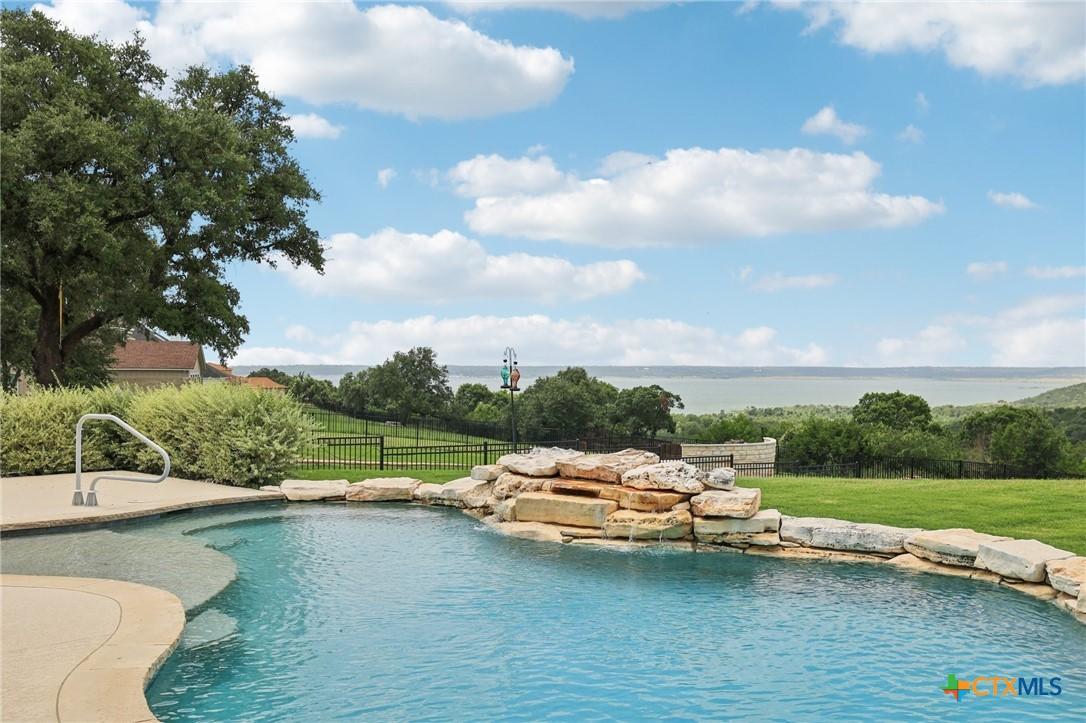Image 3: Gorgeous pool and Stillhouse Hollow Lake views.