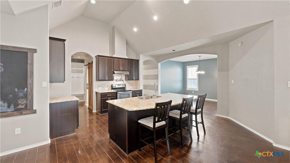 Image 1: Eat-In Kitchen Open Concept
