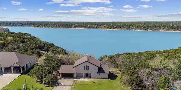 Image 2: Aerial view of front of home