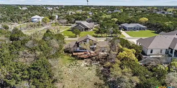 Image 3: Back aerial view of home