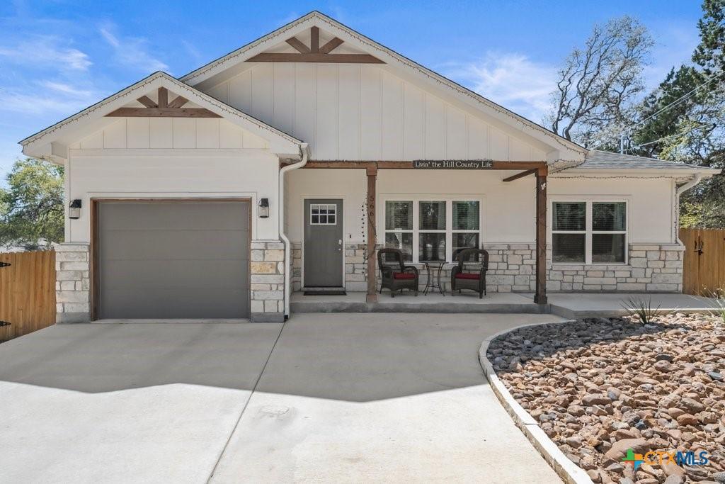 Image 1: View of front of home from driveway