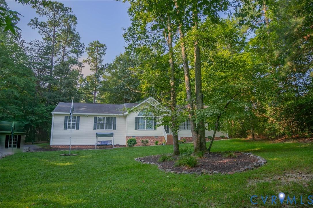 Image 3: View of front of home featuring a front yard, view