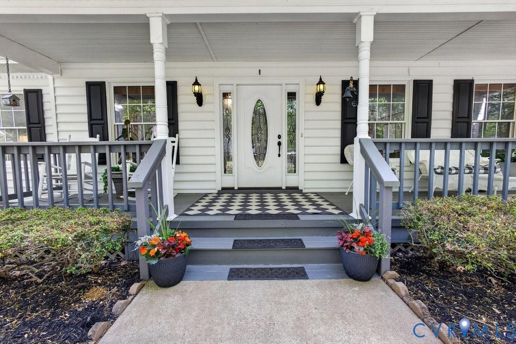 Image 4: Inviting front porch featuring a checkered pattern