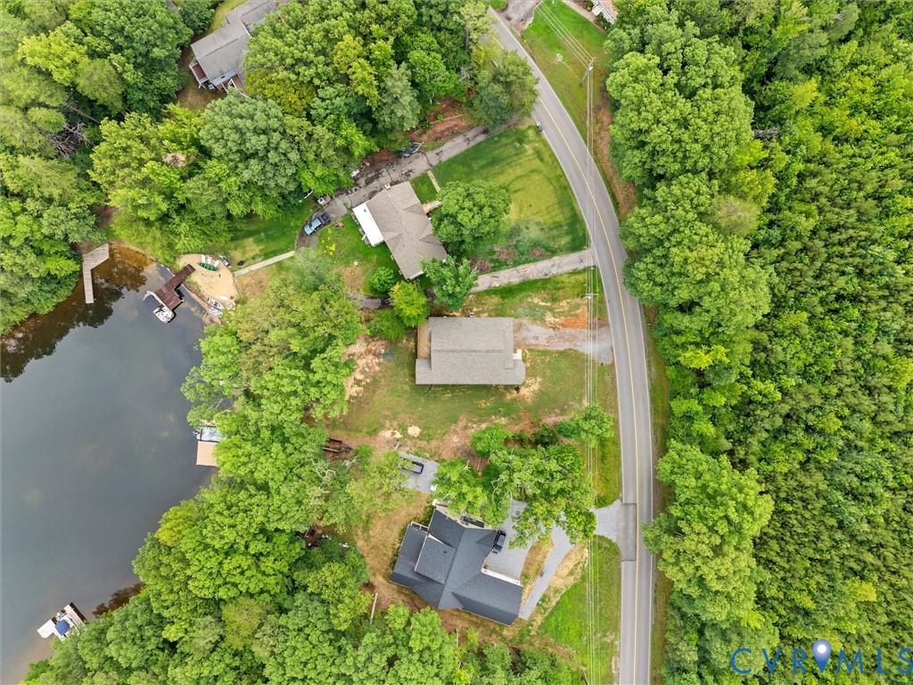 Image 4: Aerial perspective showcasing a waterfront propert