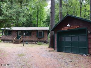 Image 2: photo 2 fron of dwelling and gaage