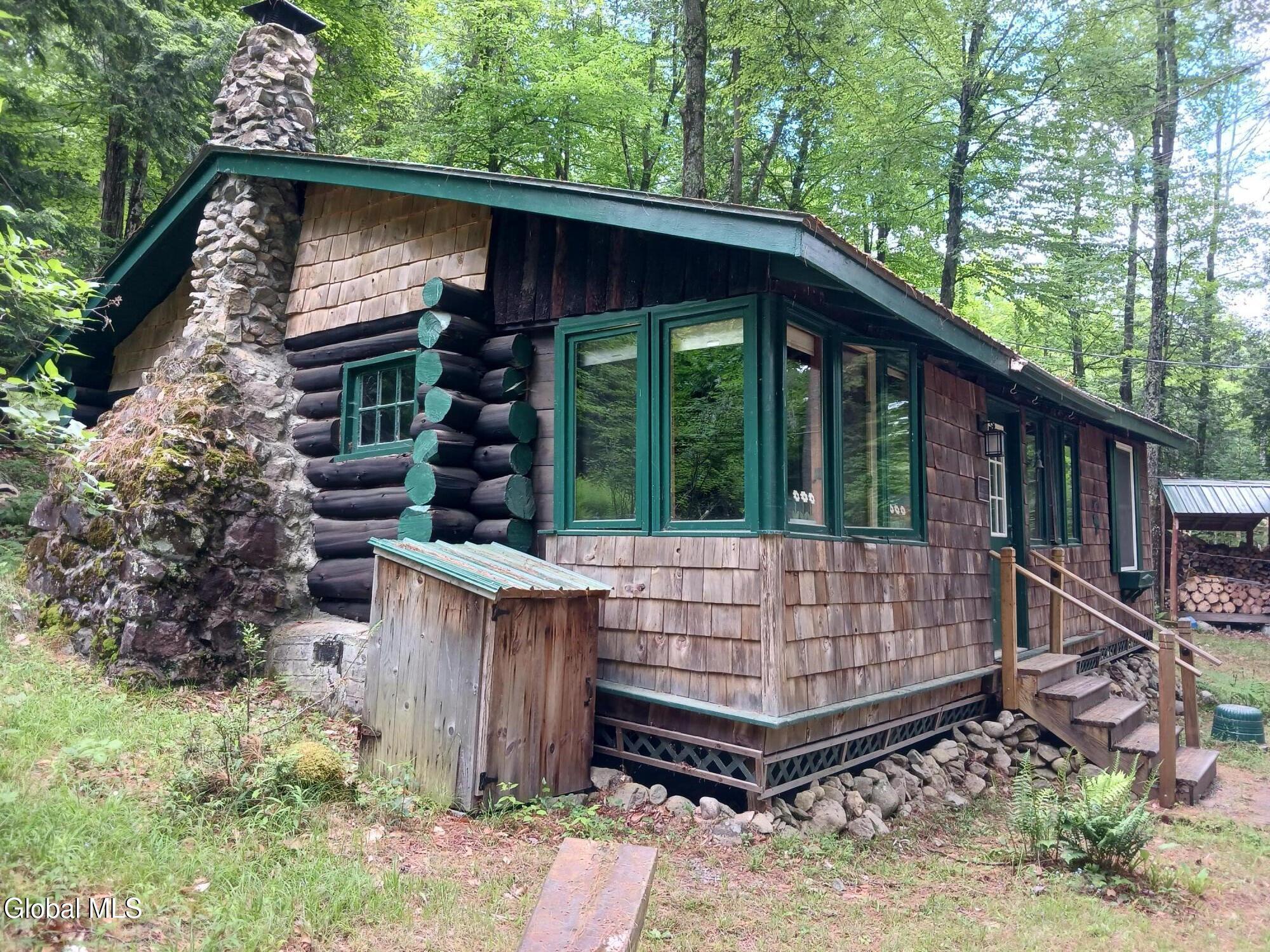 Image 3: Northside of Dwelling with Stone Firepla
