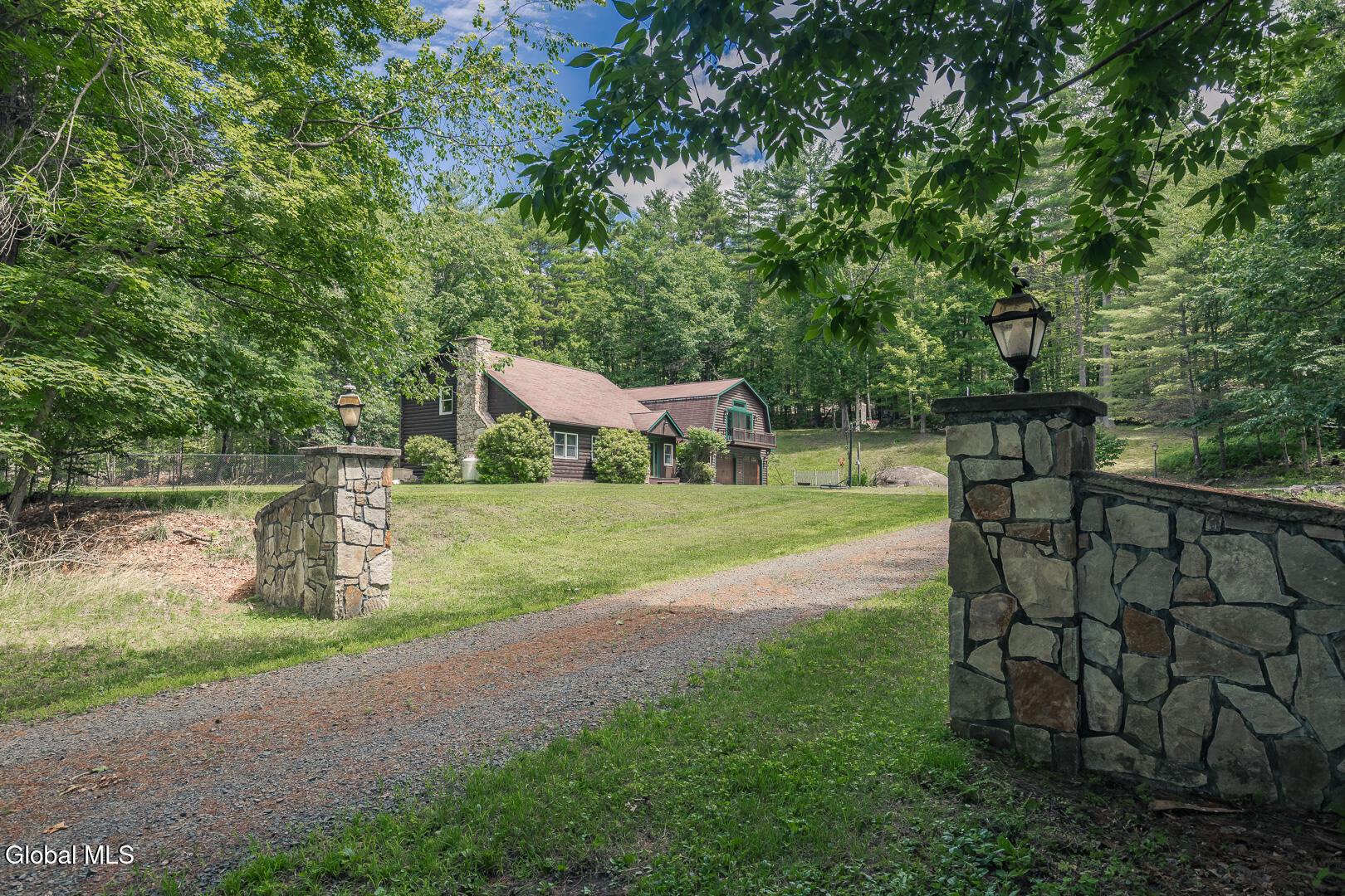 Image 1: Exterior from Driveway