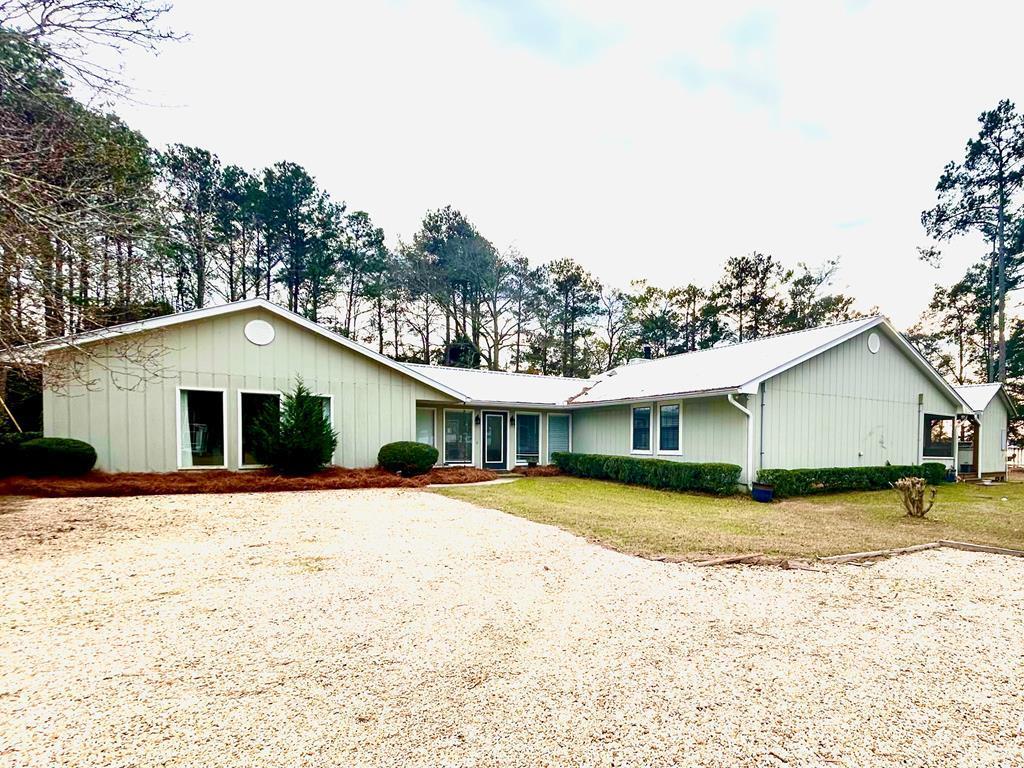 Image 2: North Side View of House