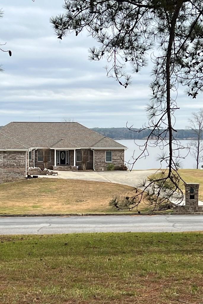 Image 4: Enjoy peaceful lake views right across the street