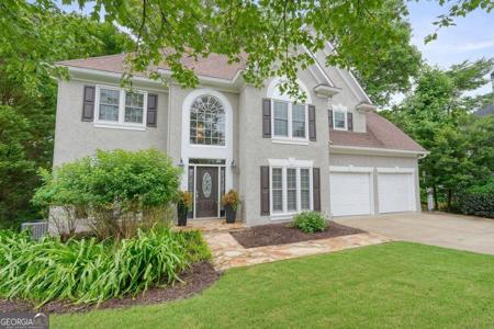 726 Whisper Wind Court, Woodstock GA 30189