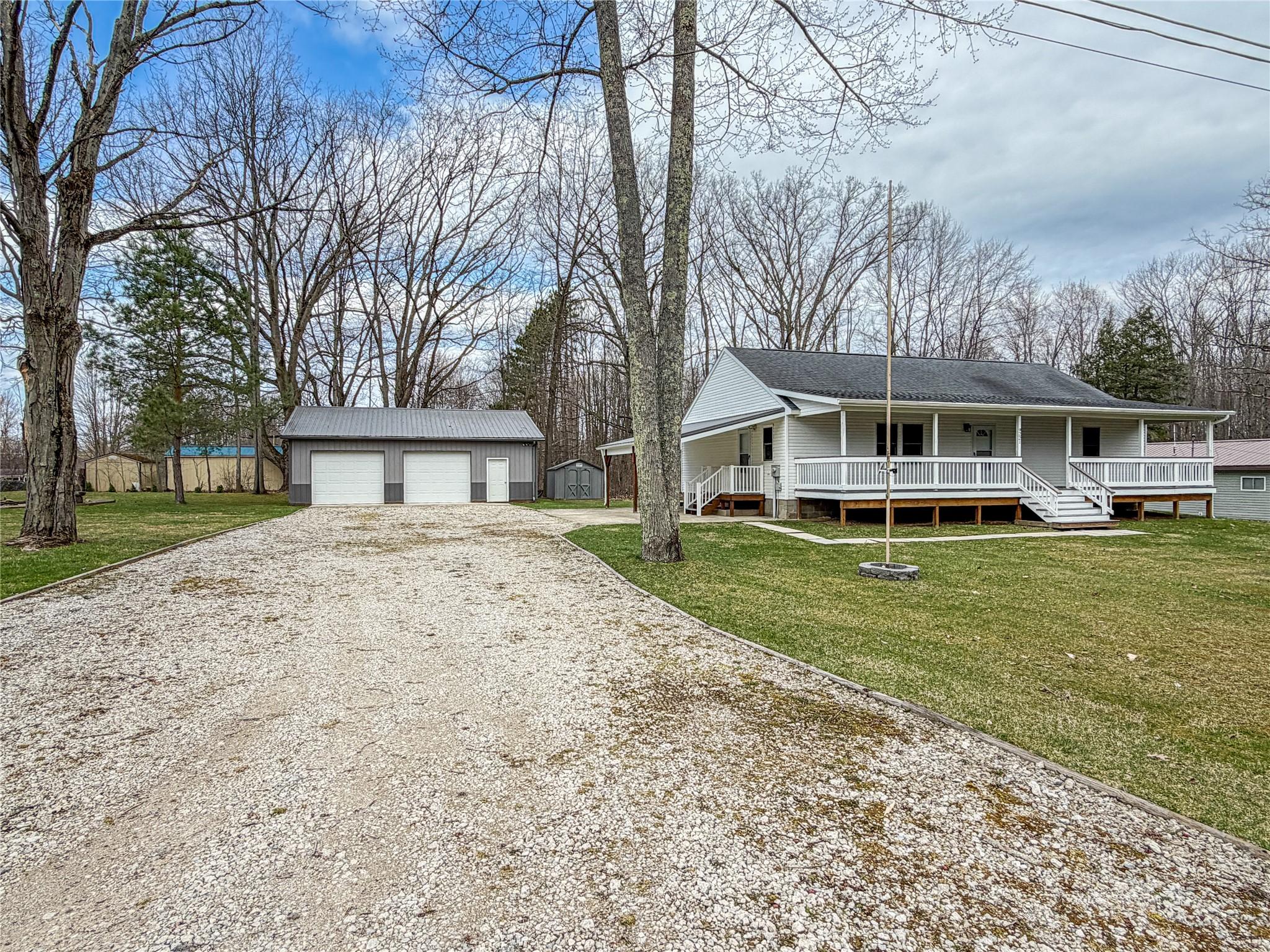 Image 1: Street view of front 9221 Warren Dr.