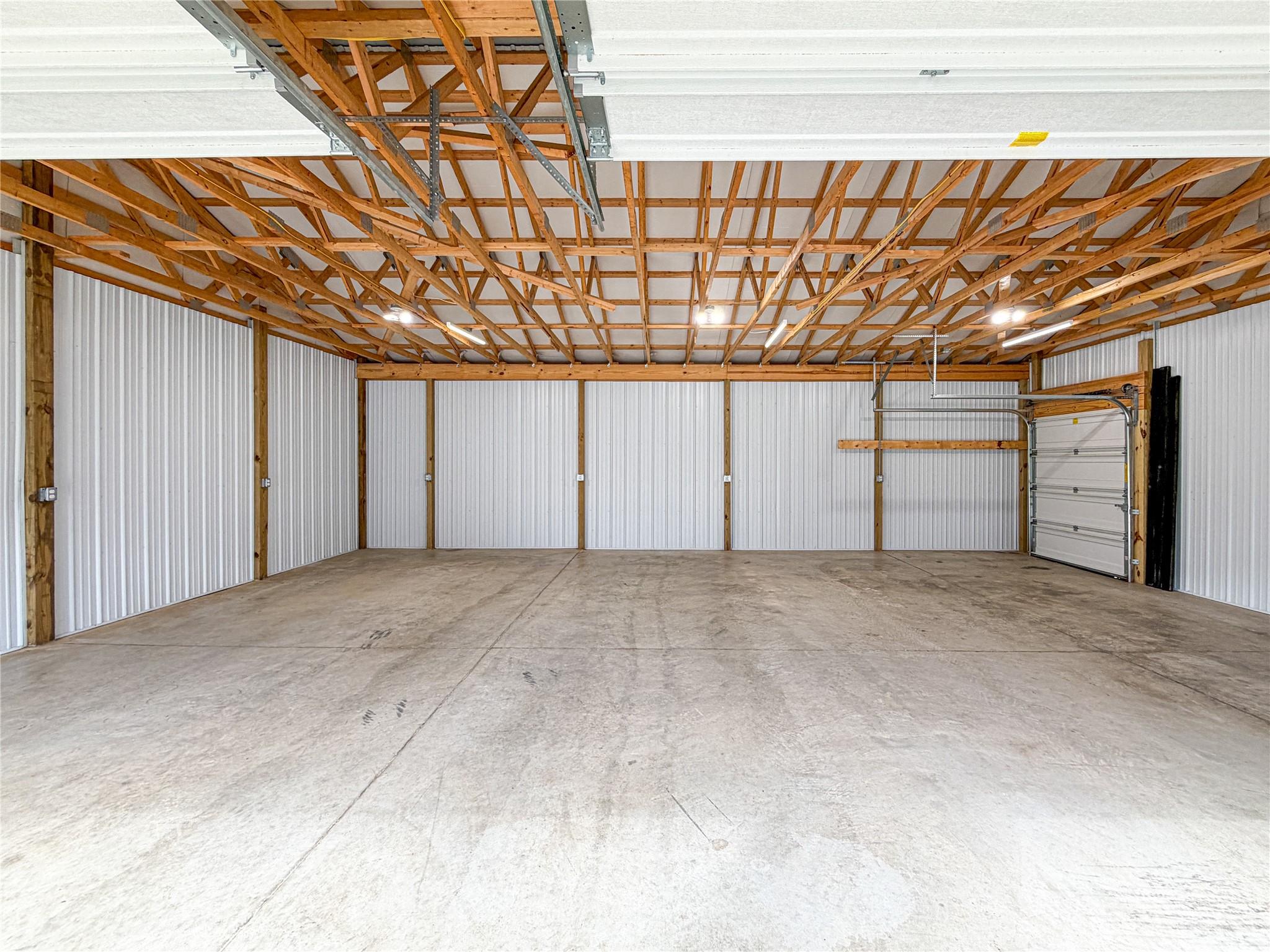 Image 4: Garage interior with utility door