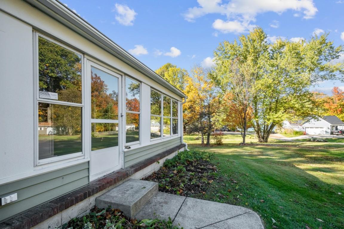 Image 3: front enclosed porch