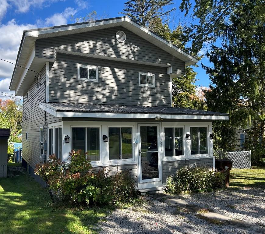 Image 1: front of house