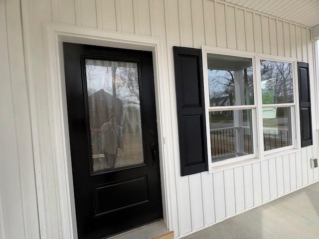 Image 4: Lovely black front door and shutters.