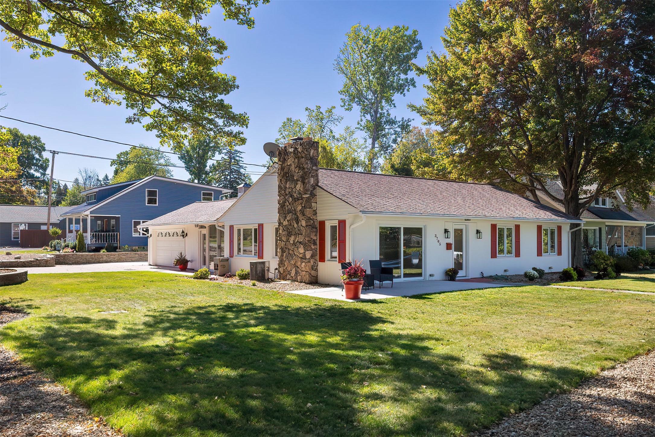 Image 1: Gorgeous corner lot with breathtaking lake views