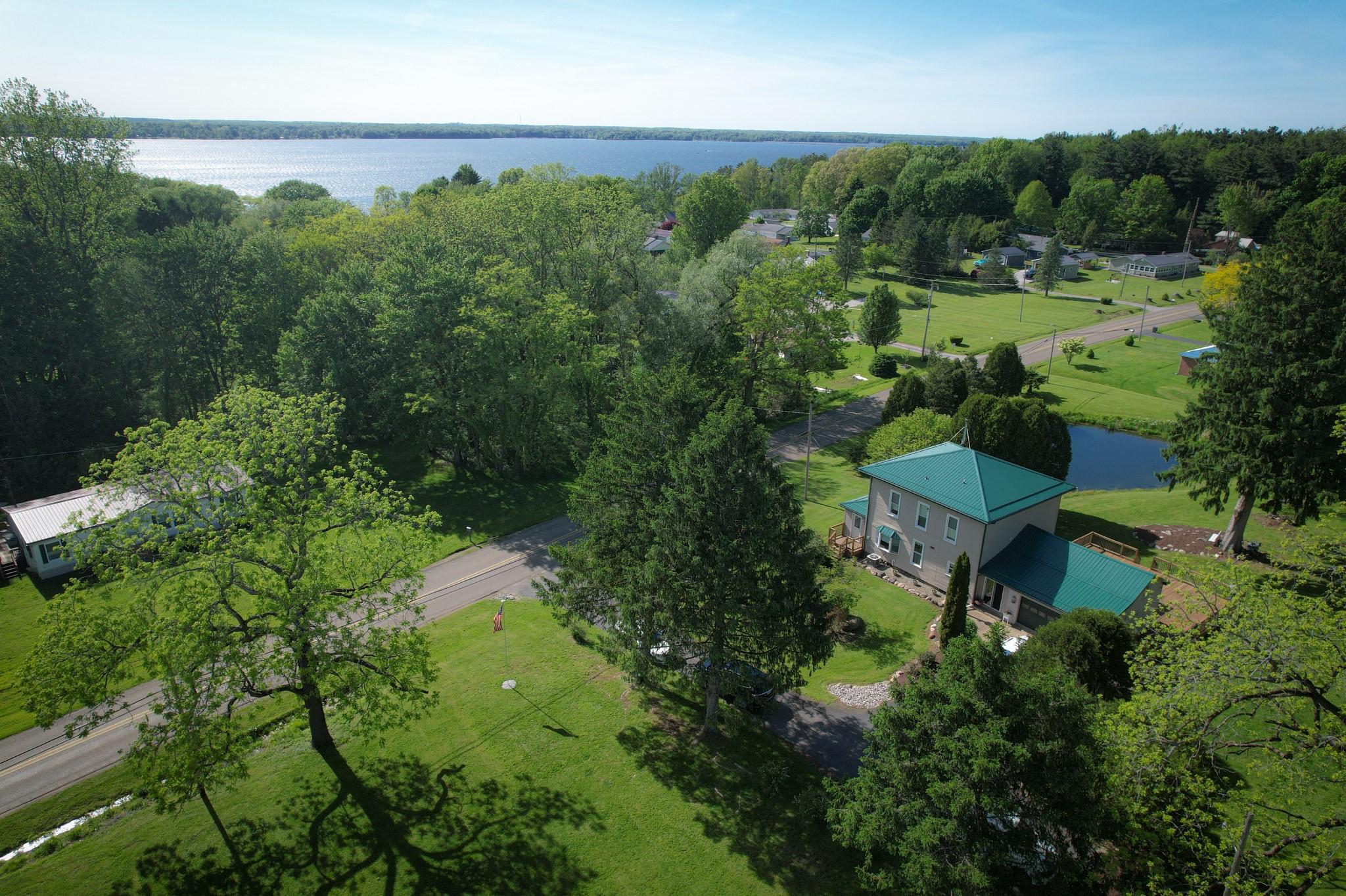 Image 4: House and Pond across from Pymatuning Lake