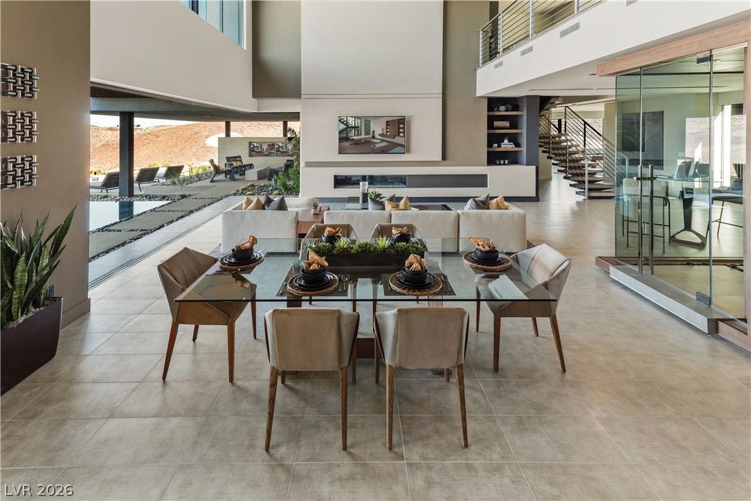 Image 4: An open-concept living area provides a sophisticat