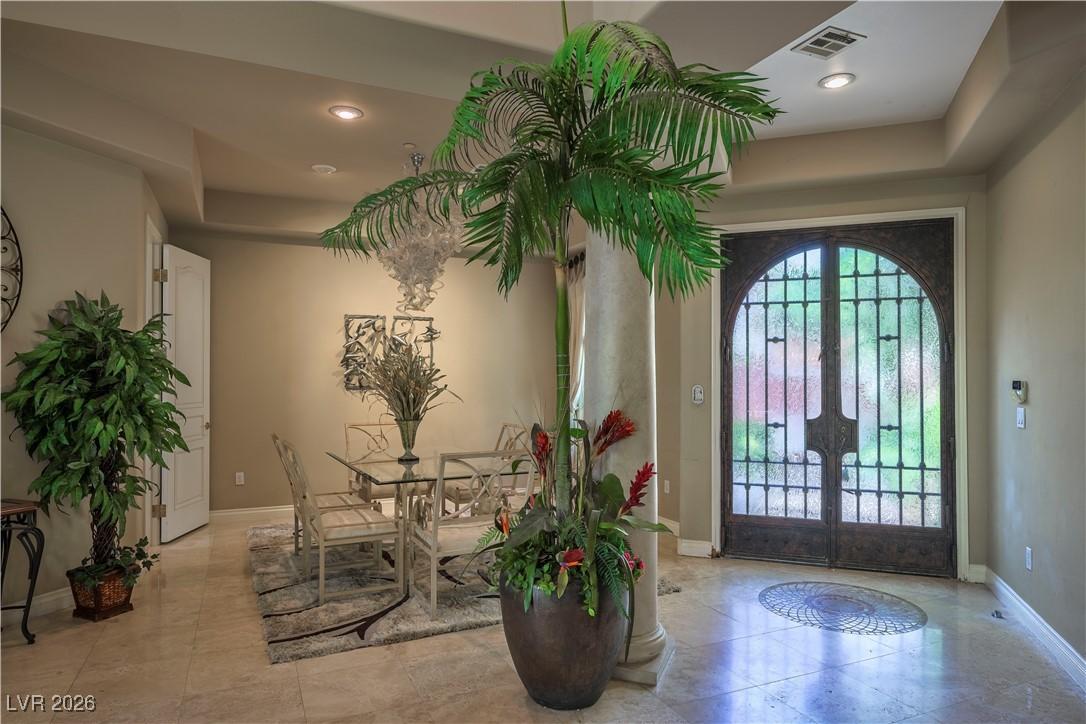 Image 4: Foyer with baseboards and recessed lighting
