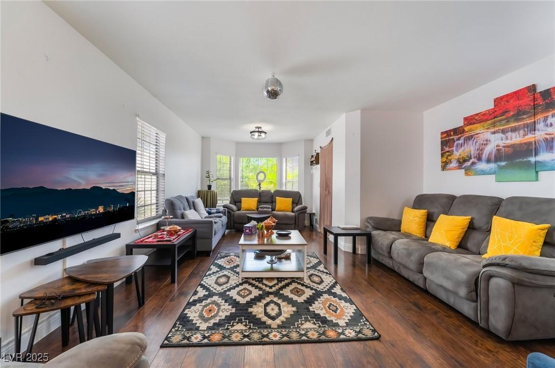 Image 4: Living room with wood-type flooring