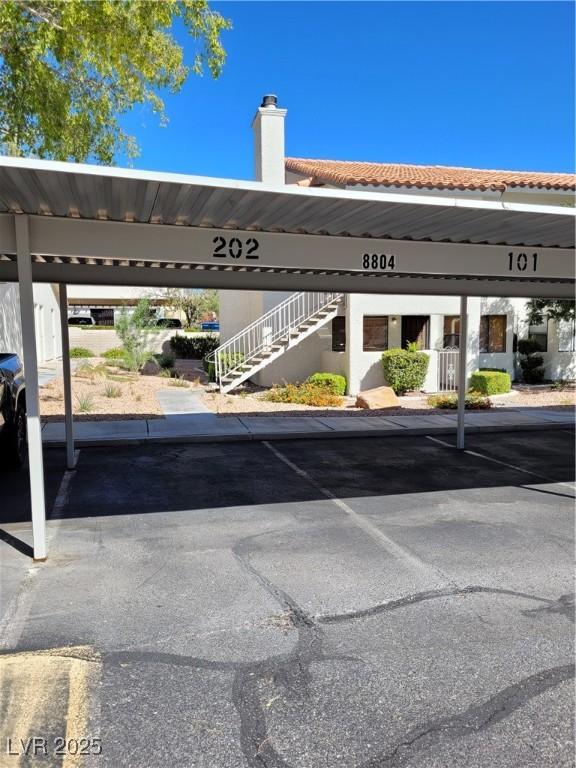 Image 4: Covered parking lot with stairs