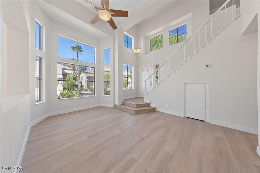 Image 4: Unfurnished living room featuring light wood-style