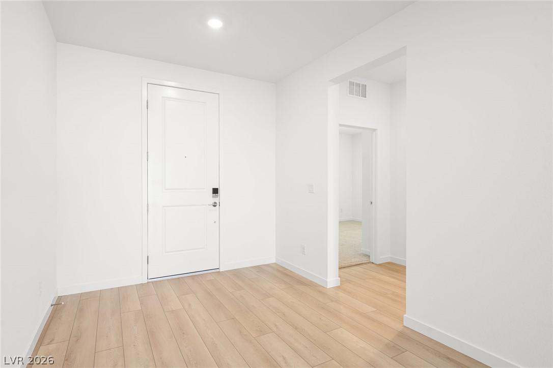 Image 3: Clean lines define this bright entry, boasting rec