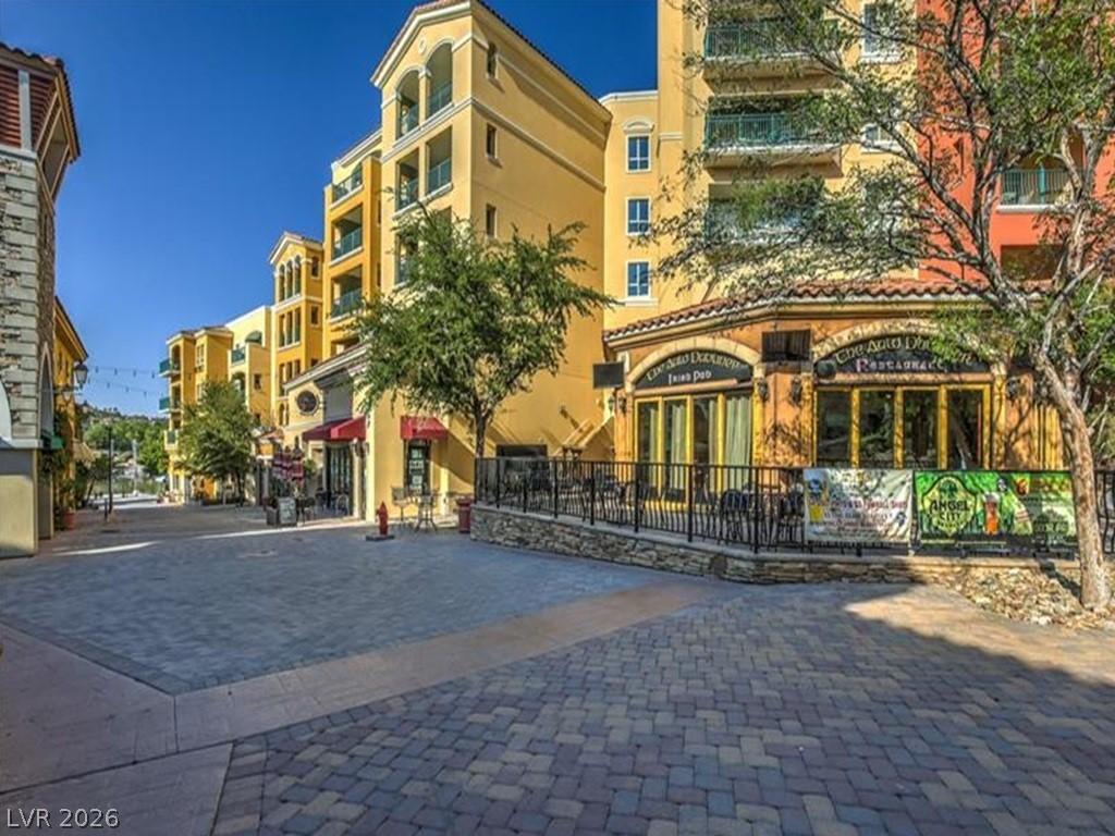 Image 4: This vibrant outdoor space features diverse archit