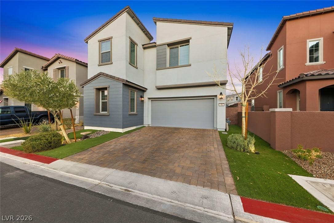 Image 4: Modern architecture and neatly landscaped yard enh