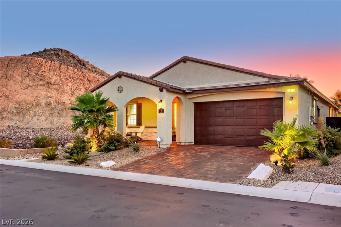 Image 2: A well-lit desert landscape frames this welcoming