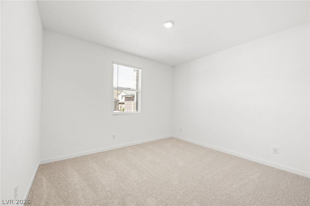 Image 4: A well-lit room offers comfort and versatility, fe
