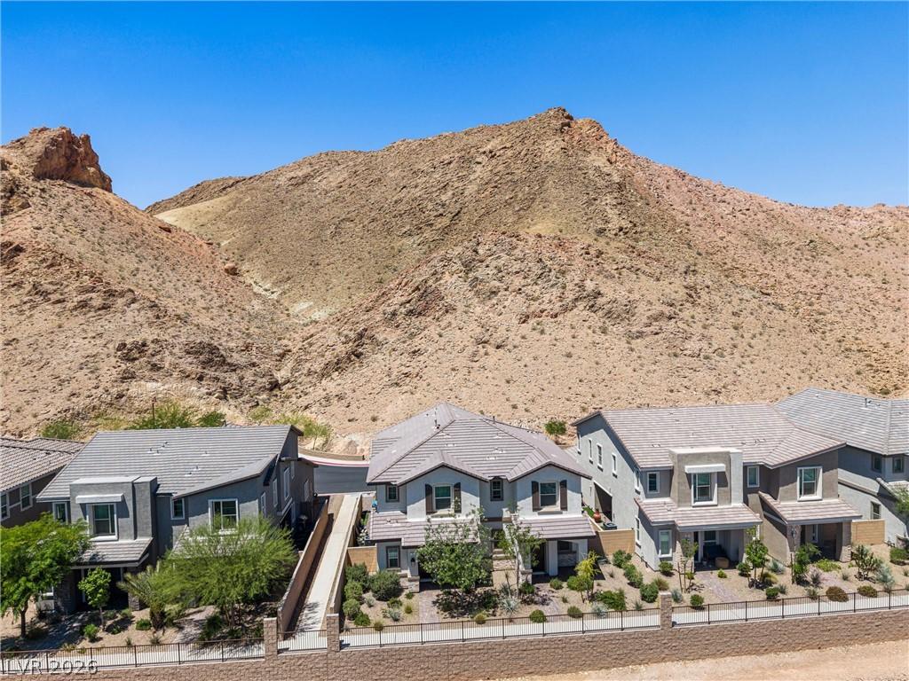 Image 4: This home offers panoramic mountain views from its