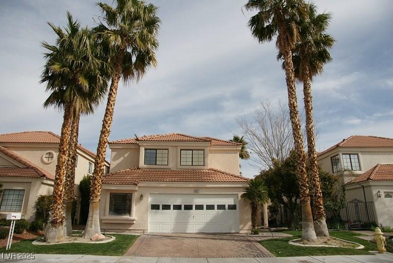 Image 1: Mediterranean / spanish house with driveway, stucc
