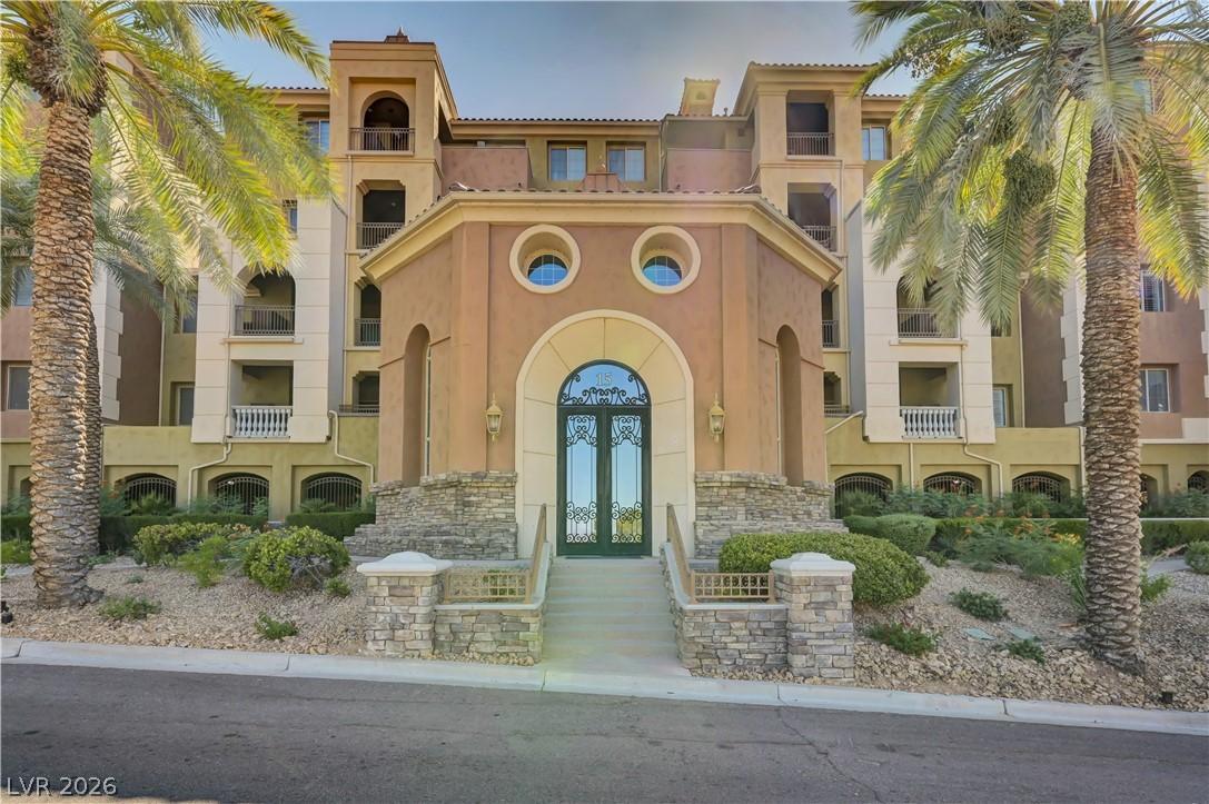 Image 1: Enter through a grand arched doorway into this ele