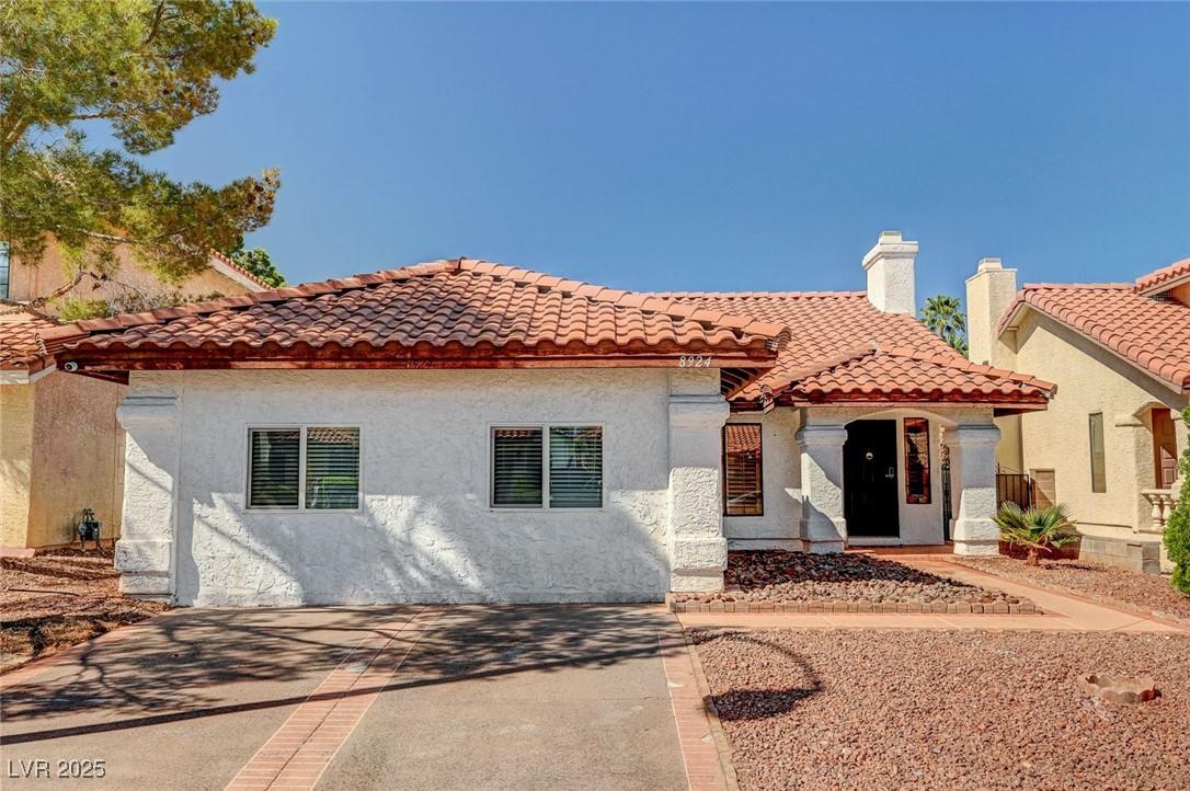 Image 2: Mediterranean / spanish home featuring stucco sidi