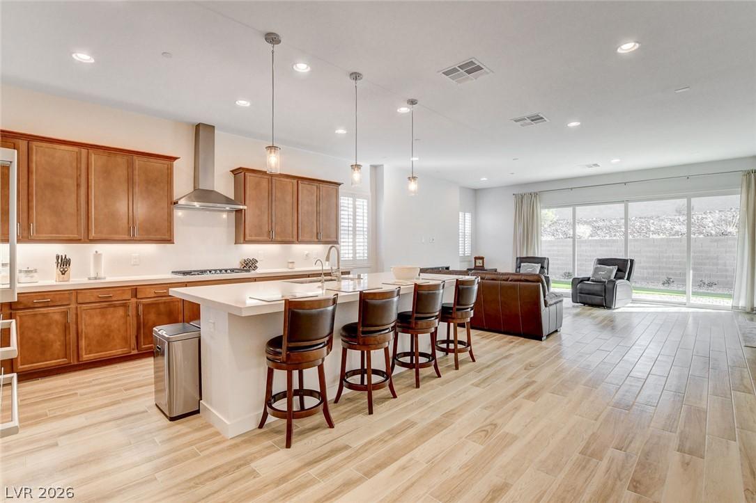 Image 3: An open-concept living space integrates a well-app