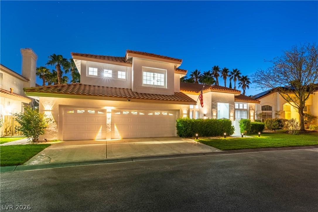 Image 2: Mediterranean / spanish home featuring driveway, s