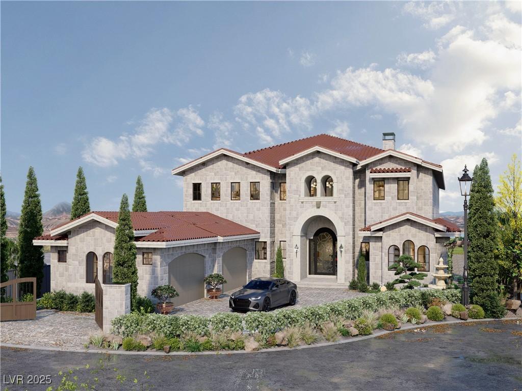 Image 1: Mediterranean / spanish-style home with a garage