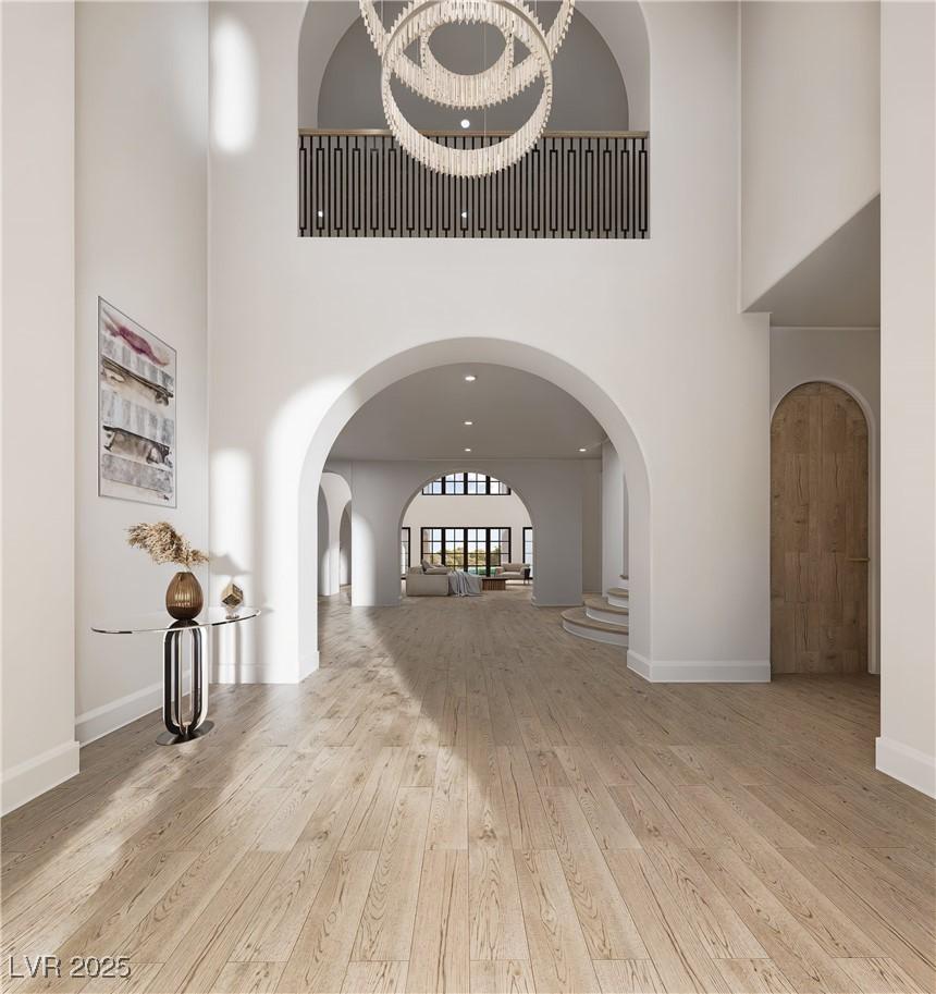 Image 2: Unfurnished living room featuring light hardwood /
