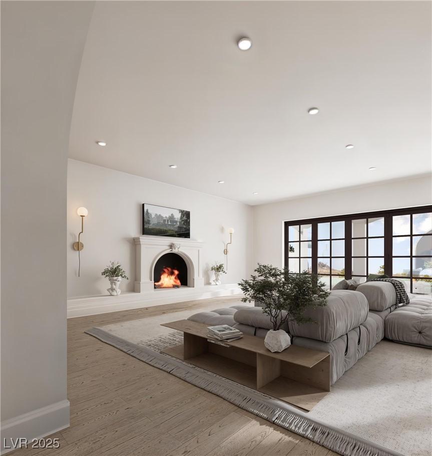 Image 4: Living room featuring wood-type flooring
