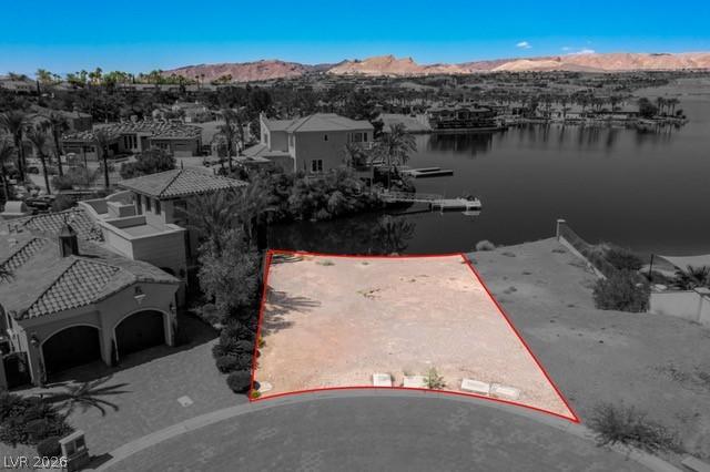 Image 4: Aerial view of residential area with property parc