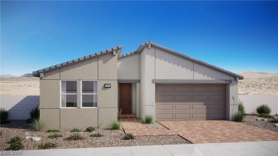 Image 1: Modern desert architecture with a welcoming brick