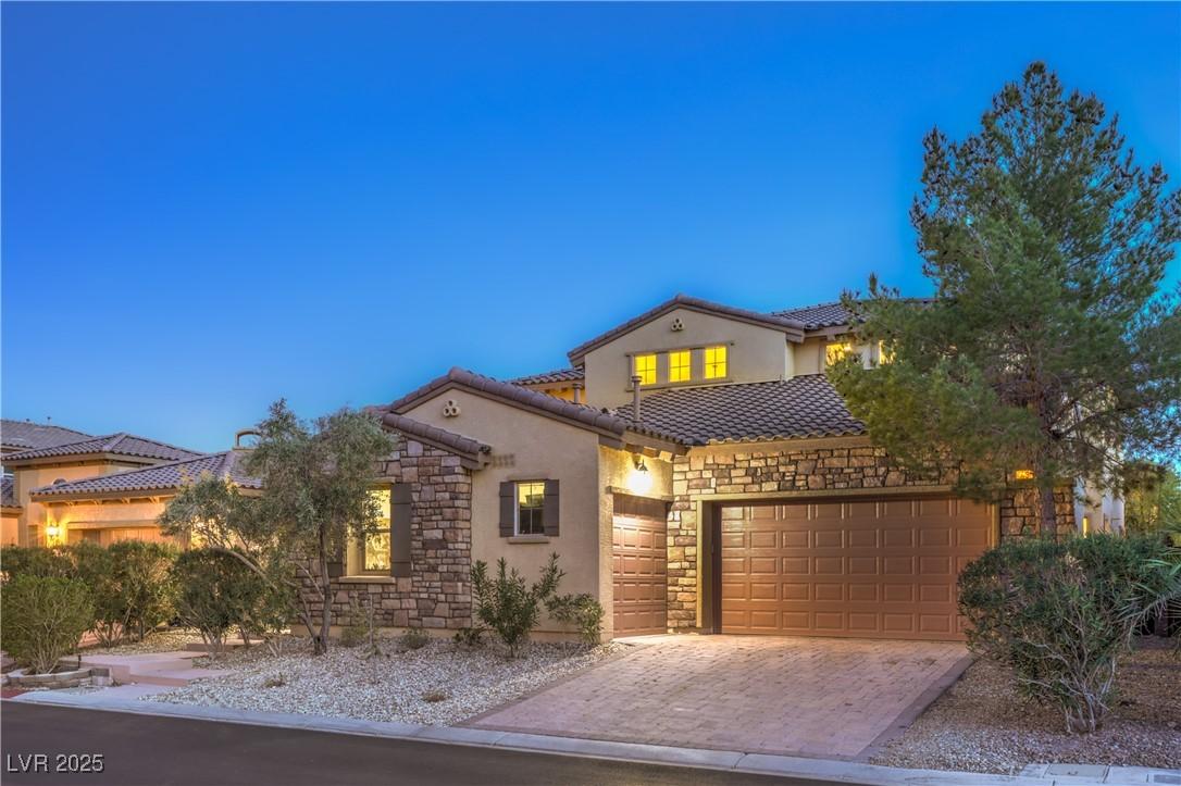 Image 3: Mediterranean / spanish house with stone siding, s