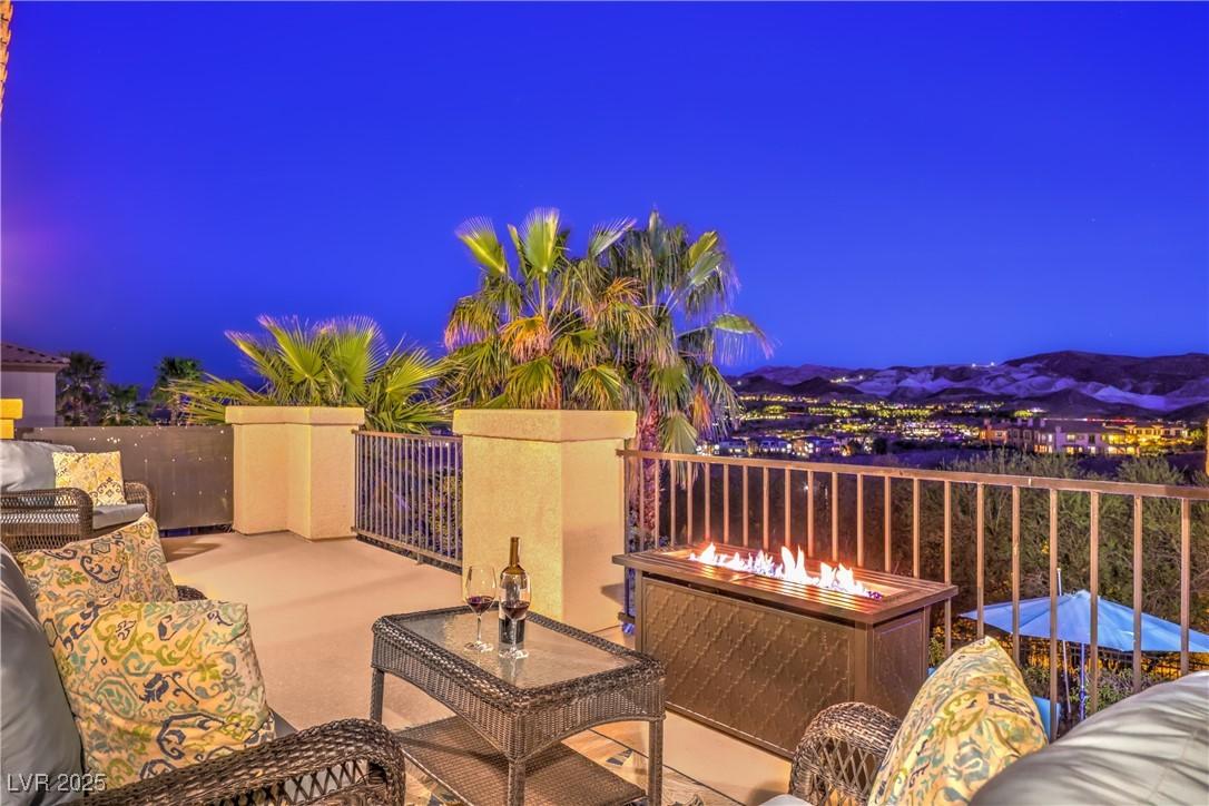 Image 4: Patio at twilight featuring a patio and a fire pit