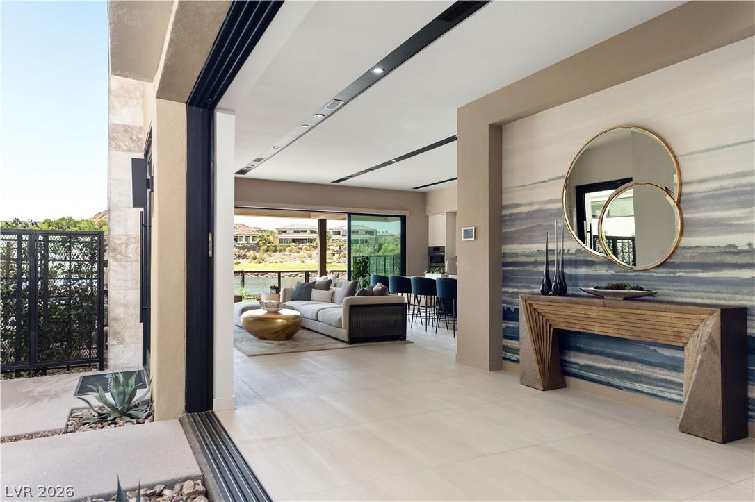 Image 3: An inviting open floorplan provides serene views o