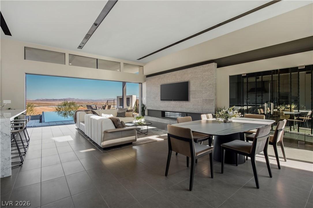 Image 4: An open concept living and dining space seamlessly